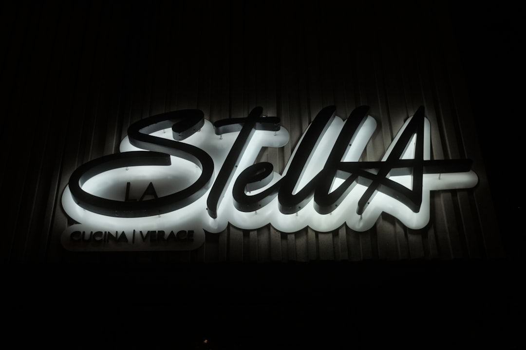 Stylized white "stella" text on black background