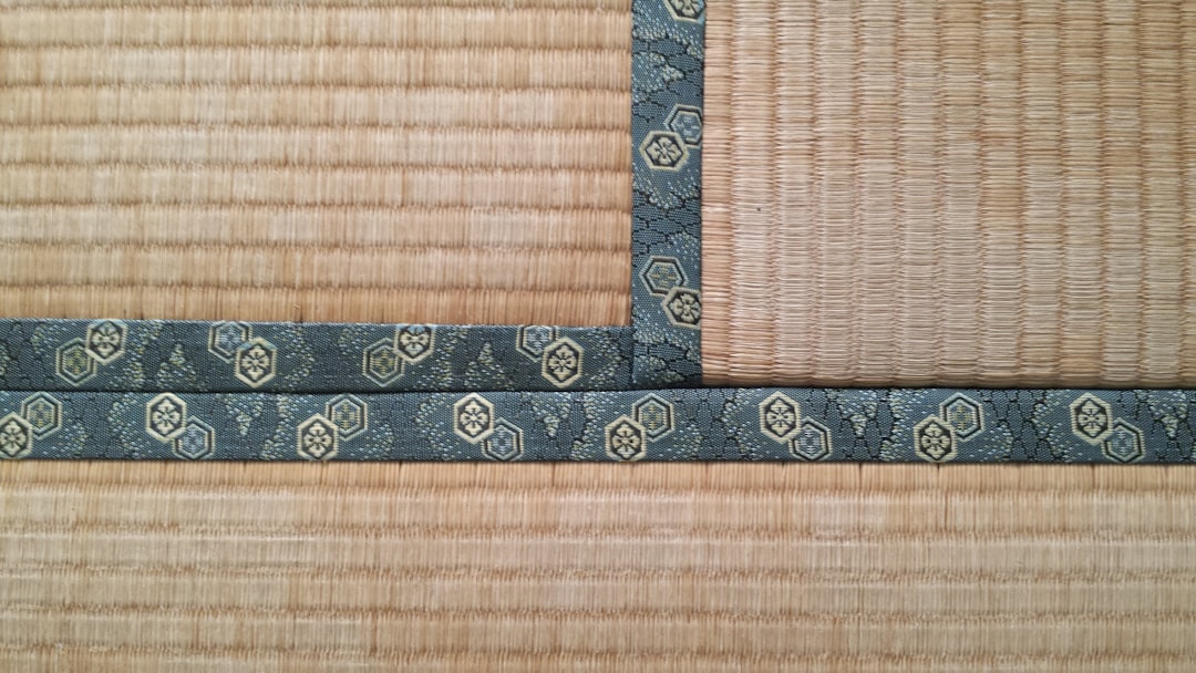 green and brown floral textile